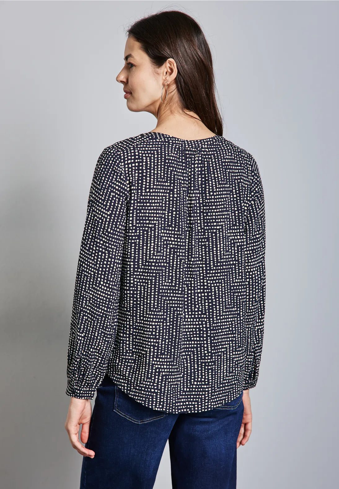 BLUSA ESTAMPADA CUELLO EN V