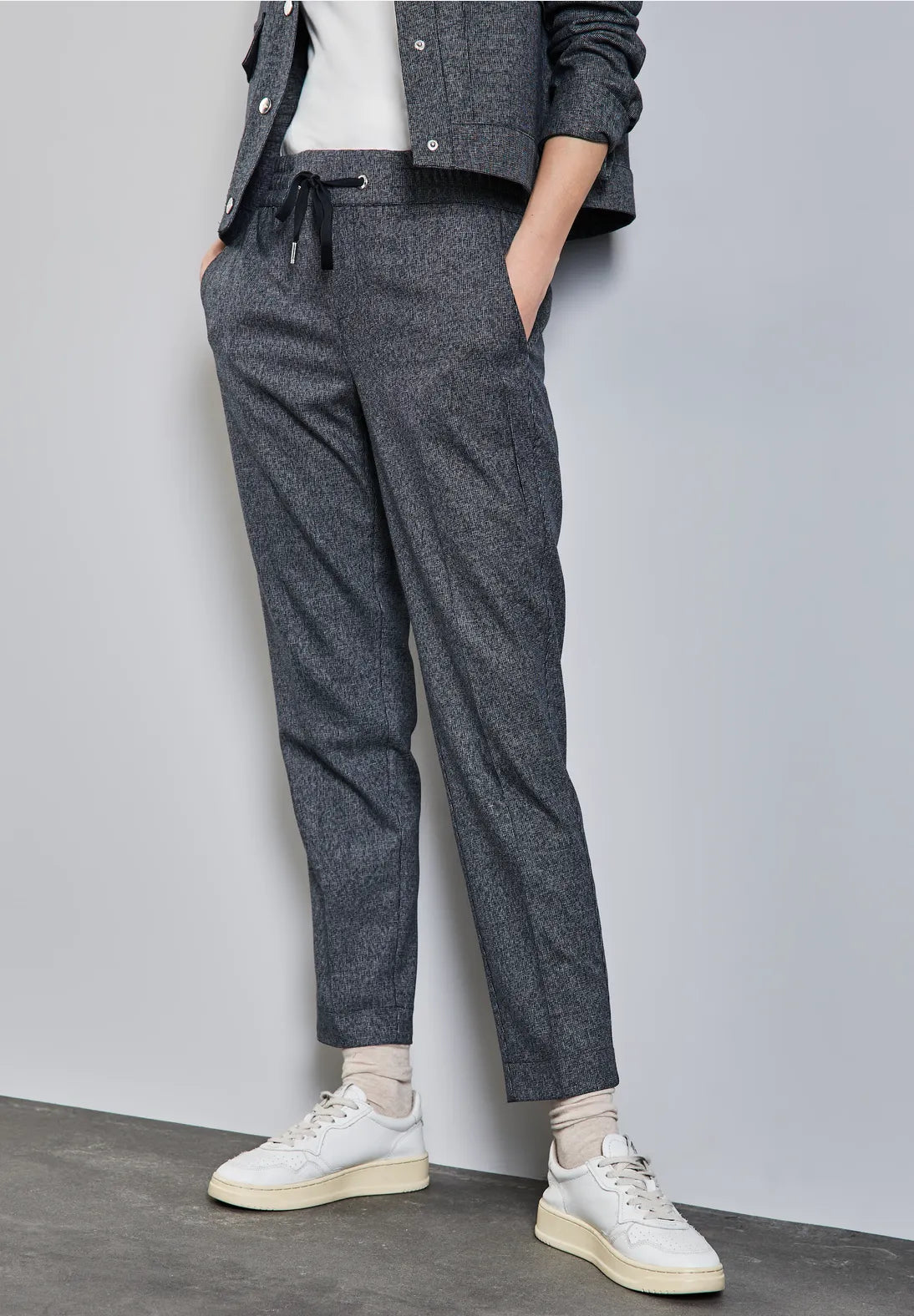 PANTALONES ASPECTO MELANGE DE PIERNAS ESTRECHAS