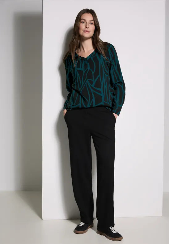 BLUSA ESTAMPADA CUELLO EN "V"