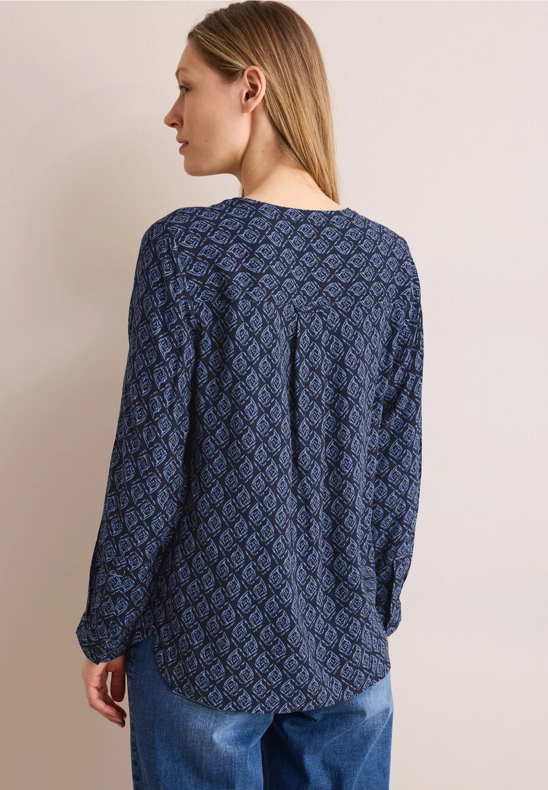 BLUSA TIPO TUNICA ESTAMPADA