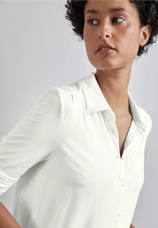 CAMISA ELASTICA TIPO POLO MANGA 3/4