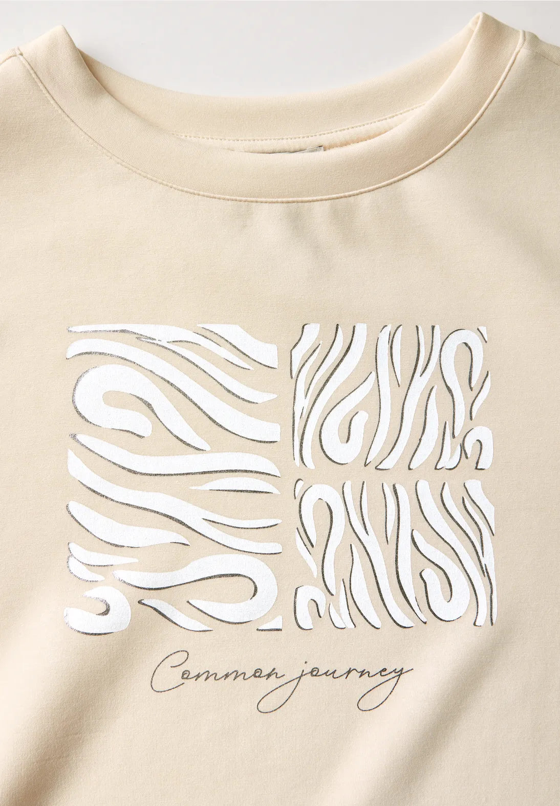 SUDADERA MANGA LARGA BEIGE PRINT BRILLANTE