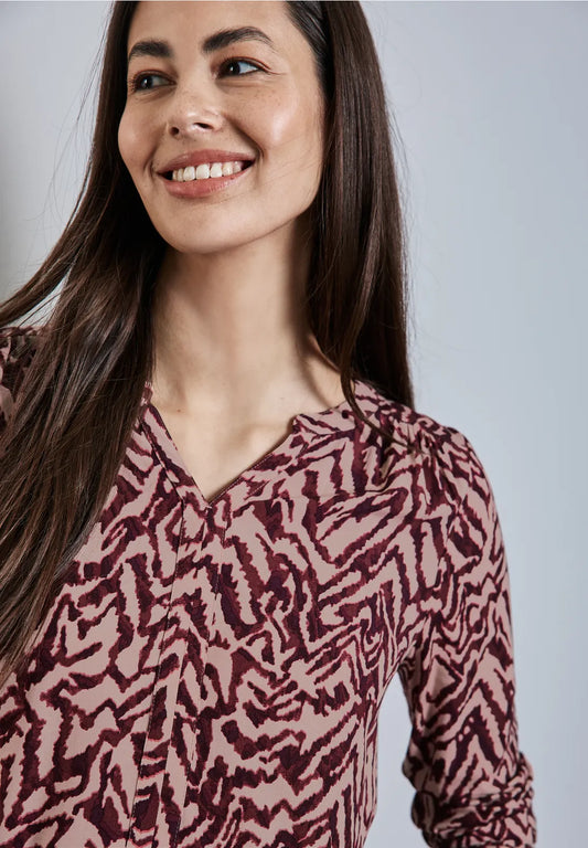 BLUSA ESTAMPADA ESCOTE ABIERTO