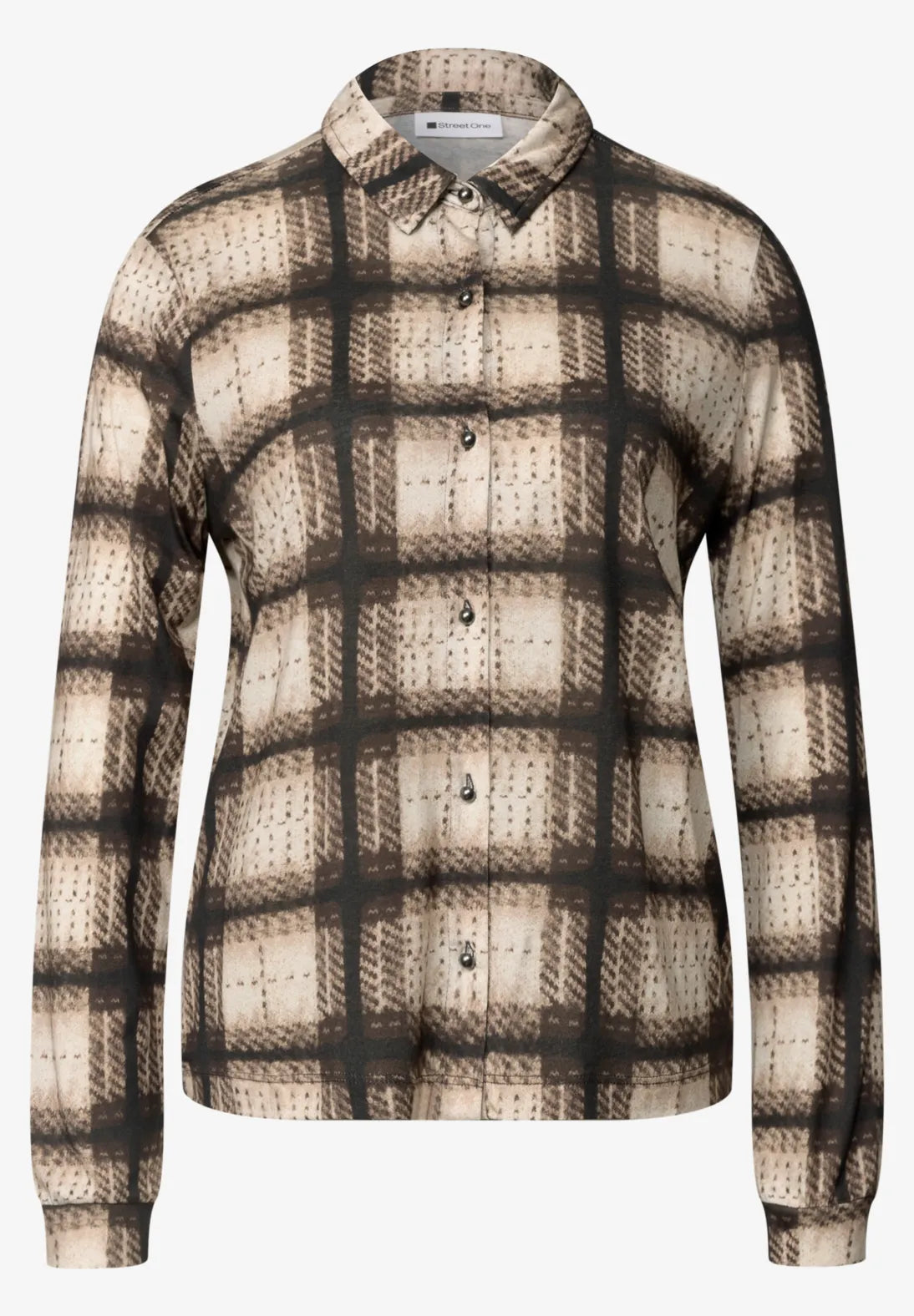 Blusa a cuadros. En3Calafell