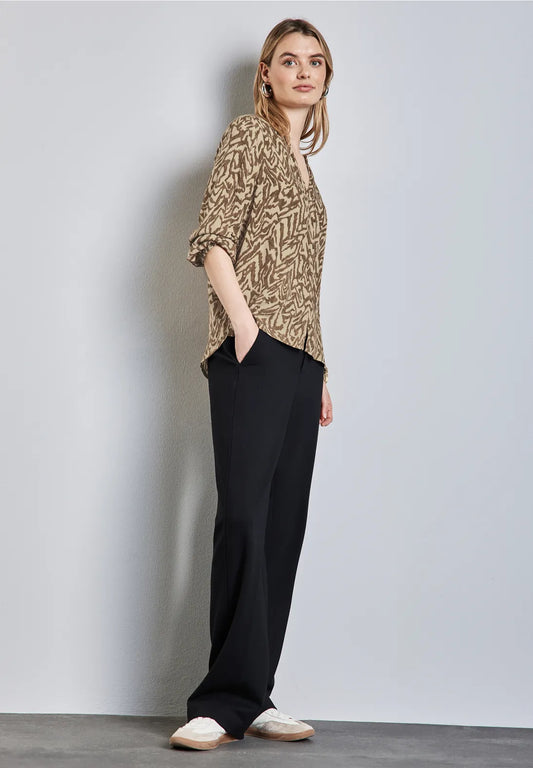 BLUSA ESTAMPADA PUÑOS ELASTICOS