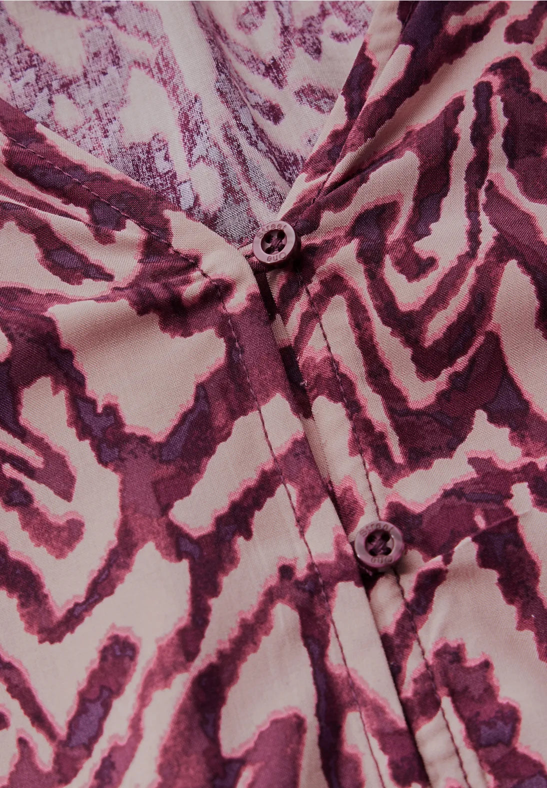 BLUSA ESTAMPADA PUÑOS ELASTICOS