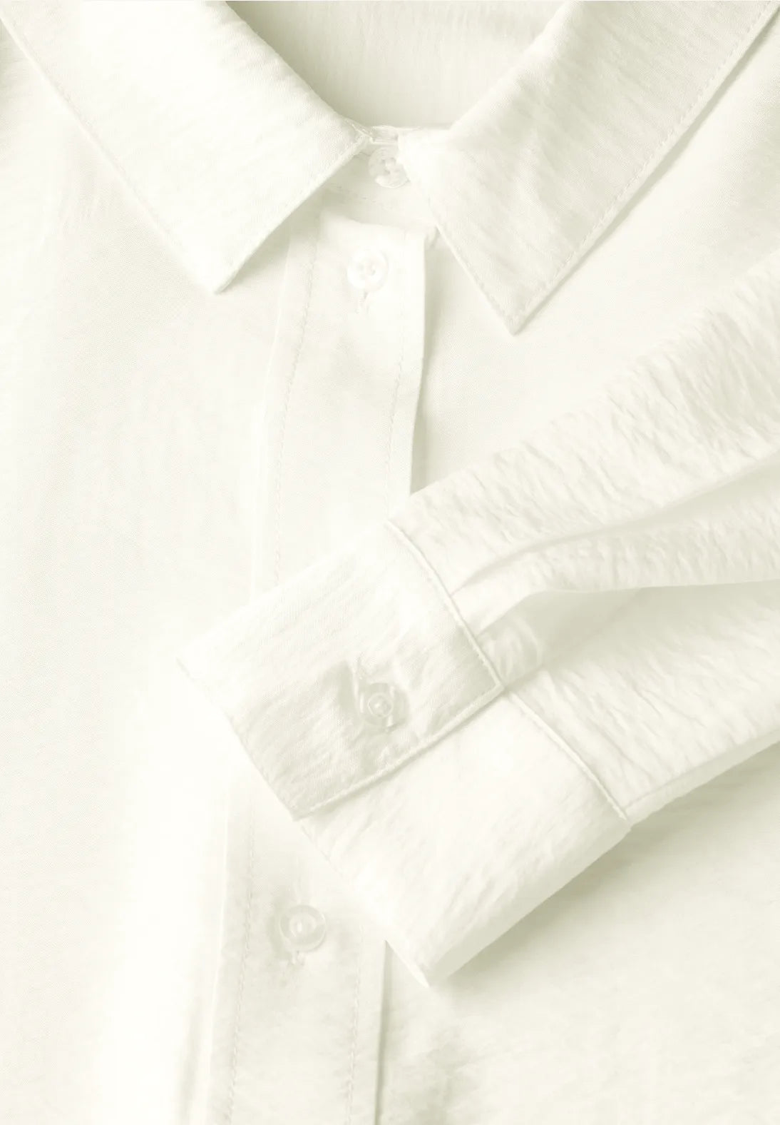 BLUSA BLANCA DE VISCOSA CON ABERTURAS LATERALES