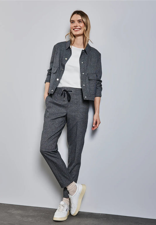 PANTALONES ASPECTO MELANGE DE PIERNAS ESTRECHAS
