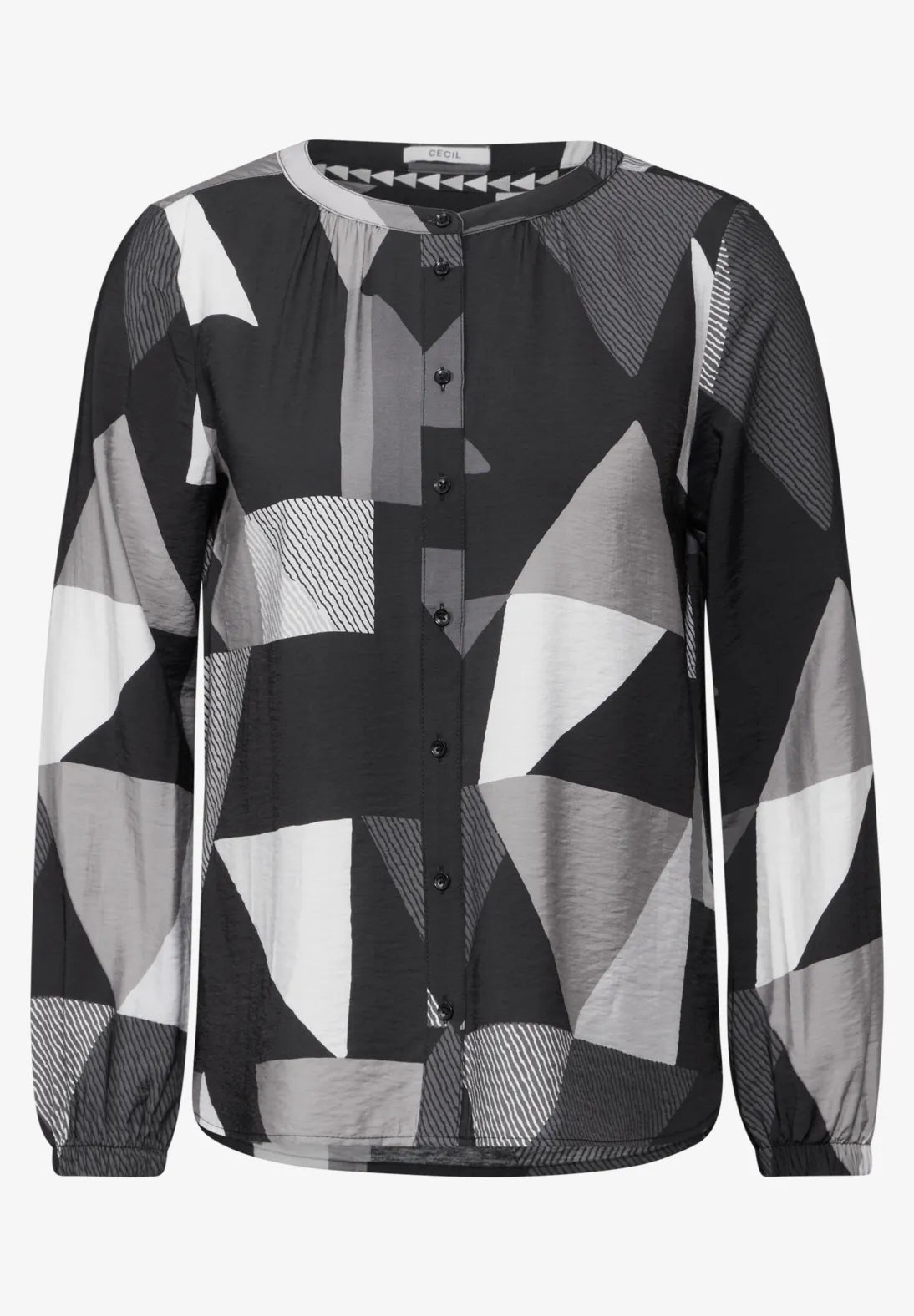 BLUSA ESTAMPADA Y CUELLO REDONDO