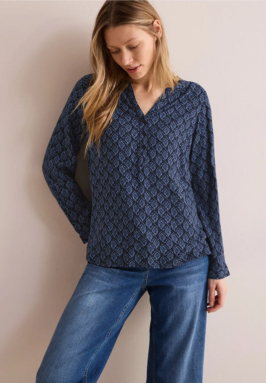 BLUSA TIPO TUNICA ESTAMPADA