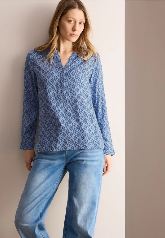 BLUSA TIPO TUNICA ESTAMPADA
