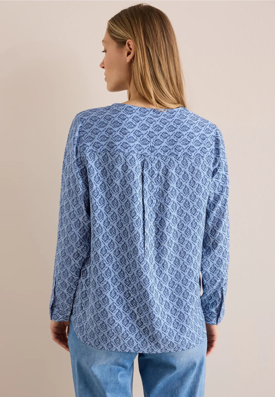 BLUSA TIPO TUNICA ESTAMPADA